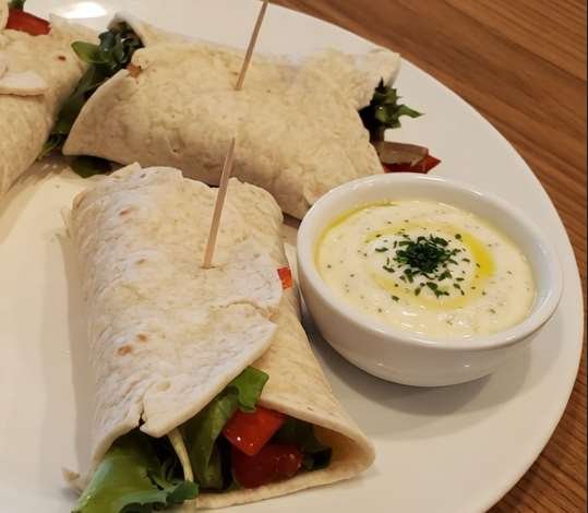 Chicken wraps with dip.